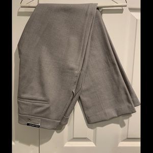 Brand new women’s dress pant. Barely Boot.